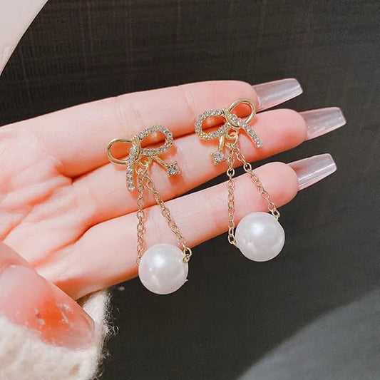 Danglers- Bow Pearls Earrings